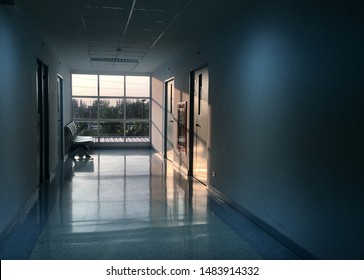 Light And Shadow In Empty Hallway Of Hospital, Dark Tone Photo.