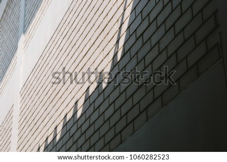 Similar – Schattenwurf an Ziegelwand mit geschlossenem Fenster im Schwung aufwärts