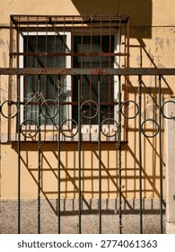 The light and shadow on the windows of the old house