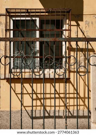 The light and shadow on the windows of the old house