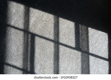 Light and shadows of window steel.  Jail, prison, catch, control, limit, arrest, confusing, no way out concepts.