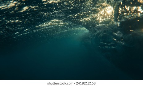 Light Shining through the back side of a wave on the north shore of oahu