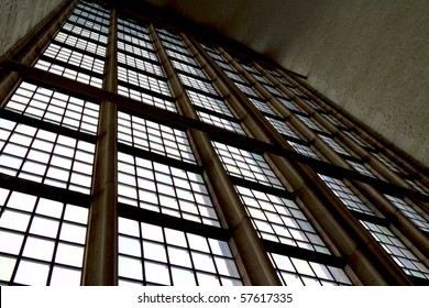 Light Shining Through A Church Window Leaving Shadows