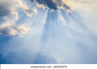 Light  Shining Through The Clouds