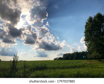 Light shining through clouds after a rain storm on a summer afternoon