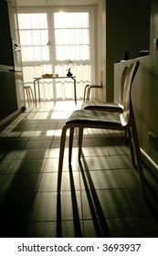 Light Shining Through Large Window In Kitchen