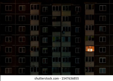 Light In A Single Window. Flat Night Panorama Of Multicolor Light In Windows Of Multistory Buildings. Life In Big City