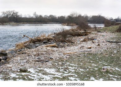 Light Snow On A River Bank Scene
