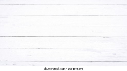 Light soft wood texture surface as painted background. Grunge white washed wooden planks table pattern top view