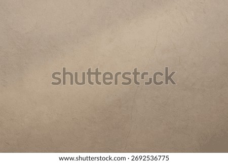 Light stone texture with warm gray tones and soft natural light