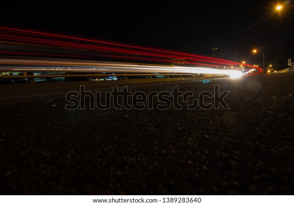 Light streaks from the\
passing cars