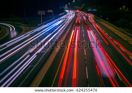 Light Streaks And Traffic Trails
