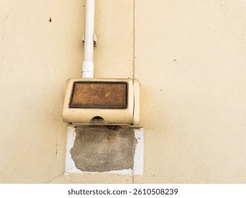 Light switch box on old cement background surface