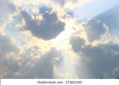 Light Through Clouds With Blue Sky 