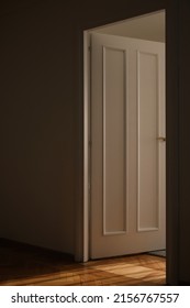 Light Through The Doorway And An Open Door In The Room