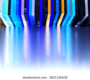 light through Stack of different colours Cast Acrylic Sheet on white background
