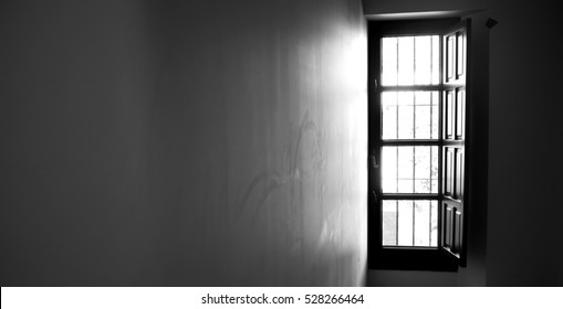 Light through window, black and white.
