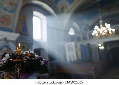 Light Through The Window To The Church. Memory Candle. Holy Light. Box Of Essential Oils. Holy Water. Gospel.