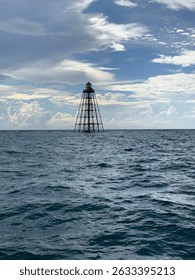 Light tower in the middle of the ocean 