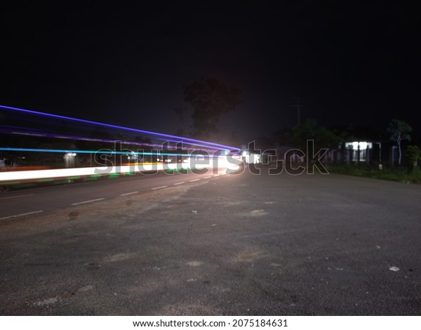 Light trail at the fork in\
the road