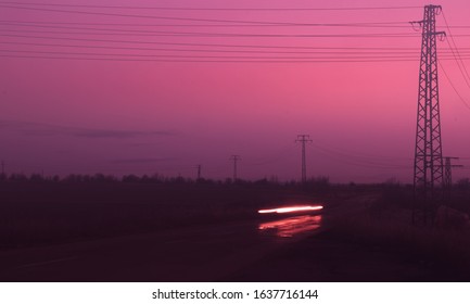 A Light Trail On A Lonely Pathway In The Middle Of Nowhere Under The Moody Sunset Full Of Aestetics.