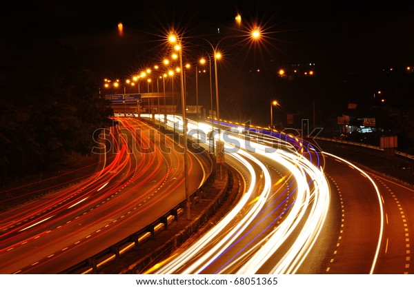 light trail view at a busy\
highway