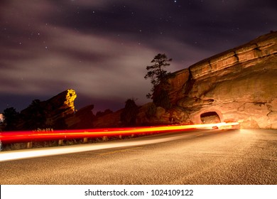 Light Trails Of A Car Passing Through A Tunnel At Red Rocks Park And Ampitheater Outside Denver Colorado