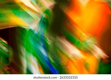 Light trails creating an abstract blurred motion background with colorful diagonal lines