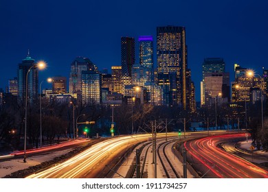 Light trails illuminating downtown Calgary roads at night - Shutterstock ID 1911734257