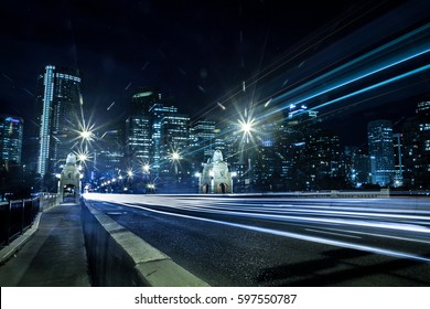Light trails on a bridge at night in the city of Calgary