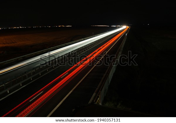 Light trails on a busy\
highway