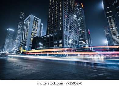 the light trails on the modern building background - Shutterstock ID 792505270