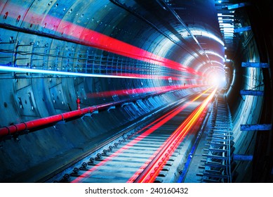 Light trails in the subway tunnel