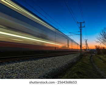 light trails of a train at sun down