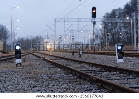 the light of a train approaching in the distance