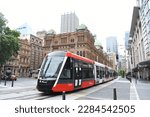 Light train in Sydney, a popular public transport for commuting City. Light trains travel through Queen Victoria memorial hall, Australia. Most modern public transport which replaced tram in Australia