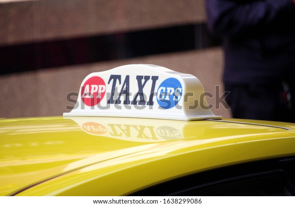 Light turned on\
on Taxi meter sign shows able to call by app and has GPS on car\
room for passenger or customer\
in