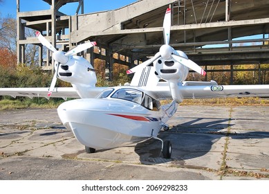 Light Twin-engine Amphibious Aircraft On The Shore