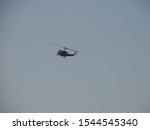 Light Utility Helicopter. Helicopter for transportation of individuals or medical on background of a blue sky