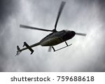 Light Utility Helicopter. Helicopter for transportation of individuals or medical on background of cloudy sky, helicopter medium, civilian type