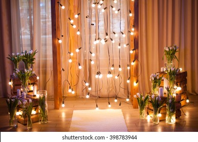 A light and warm spring decoration with tulips and bulbs for a lovely wedding couple - Shutterstock ID 398783944