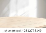 light from window on empty minimalistic background. empty tabletop for your product