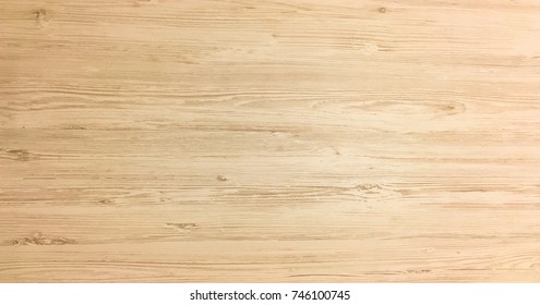 Light wood texture background surface with old natural pattern or old wood texture table top view. Grunge surface with wood texture background. Grain timber texture background. Rustic table top view