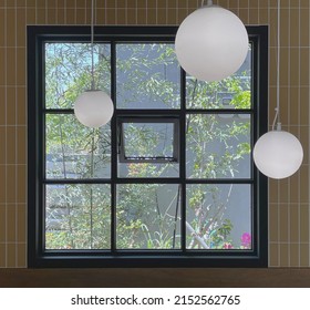 Lightballs in front of a window