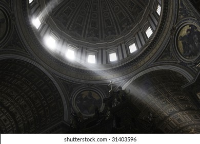 Lightbeams falling through the windows of the dome of Saint Peter's Basilica on the cross of the altar, Vatican, Rome, Italy, Europe