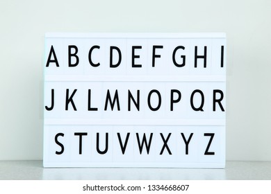 Lightbox With Letters On Grey Background