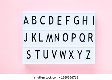 Lightbox With Letters On Pink Background