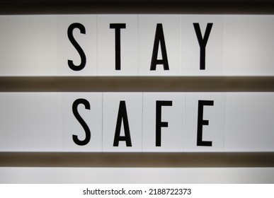 Lightbox Sign Saying Stay Safe Written In Black Letters On White Background