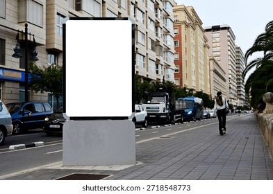 lightbox with vertical blank ad panel. billboard display. empty white advertising sign. mockup base. city transit station. urban street. green park and street setting with palm trees. outdoor advert