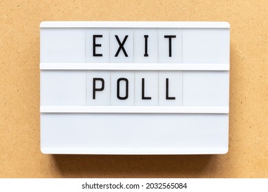 Lightbox With Word Exit Poll On Wood Background